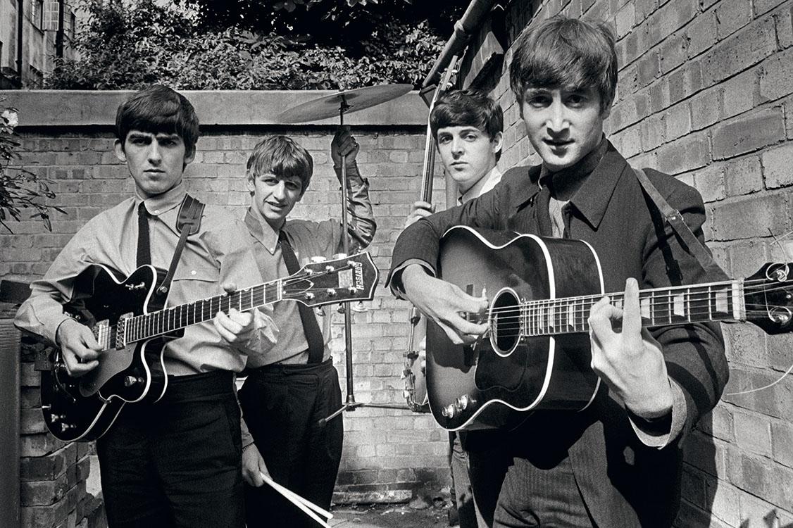 Terry O'Neill - The Beatles in a Backyard, London 1963 - Courtesy Eduard Planting Gallery